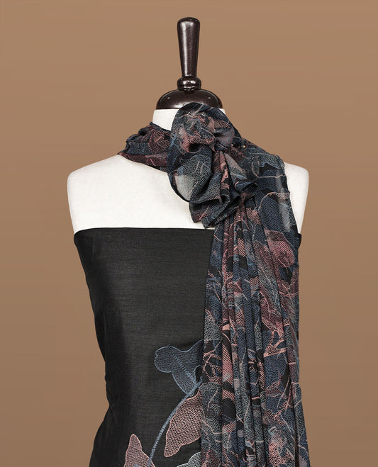 Black colour churidar material featuring thread & sequins Worked pattern on body, comes with matching bottom and dupatta.