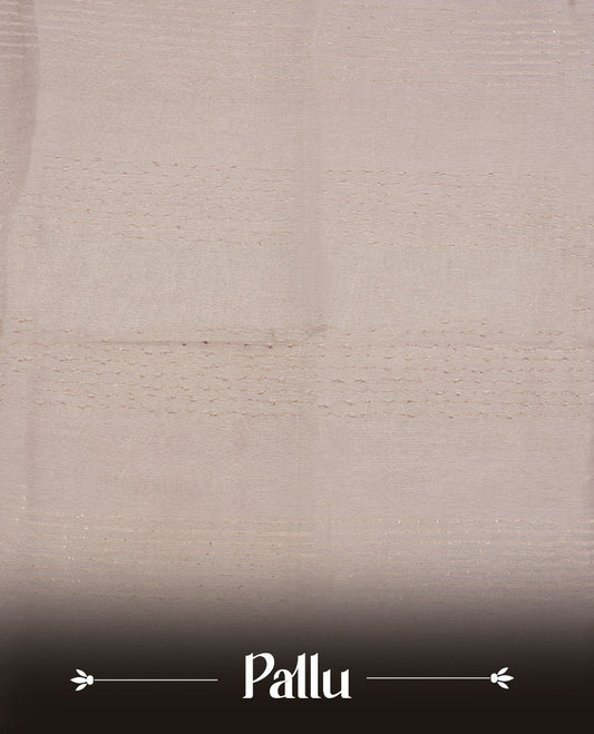 Cream colour semi jute saree highlighting white thread motifs on body, without border and paired with matching blouse.