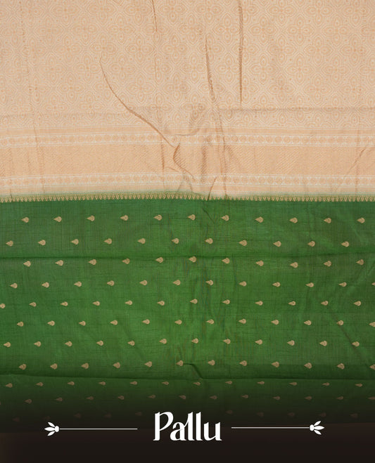 Green colour semi tussar saree featuring gold zari buttas across body, contrast cream colour gold zari border and comes with matching blouse piece.