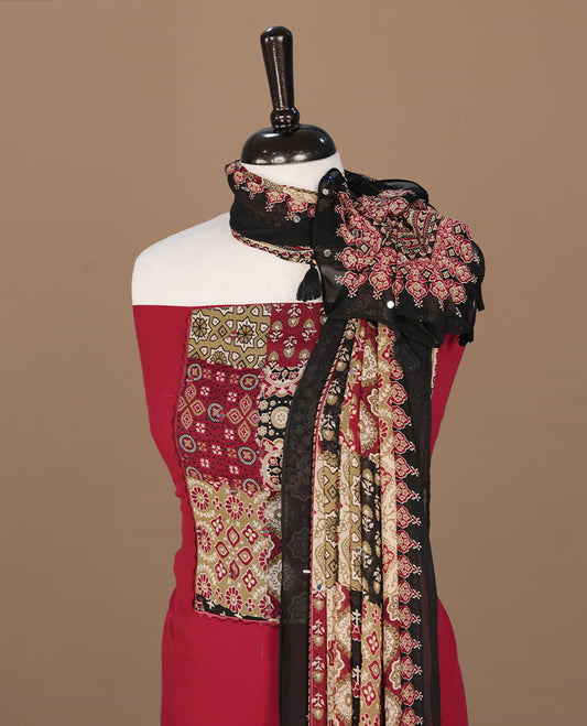 Red colour georgette salwar suit collection featuring plain body enhanced with elegant black bunch kalamkari print on neck yoke, detailed with subtle mirror work , paired with kalamkari printed dupatta with mirror work with santon material bottom.