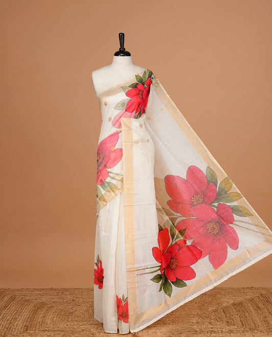 Cream Colour Organza Kerala Saree Featuring  Red floral Printed Motifs On The Body, Enhance By A Gold Zari, Paired With A Matching Blouse Piece.
