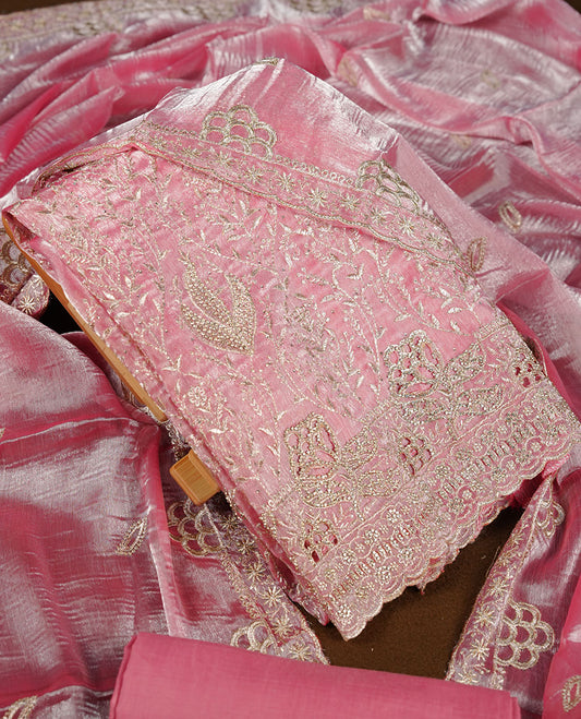 Pink colour churidar set with stone and thread embroidery and detailing, paired with matching pant and dupatta.