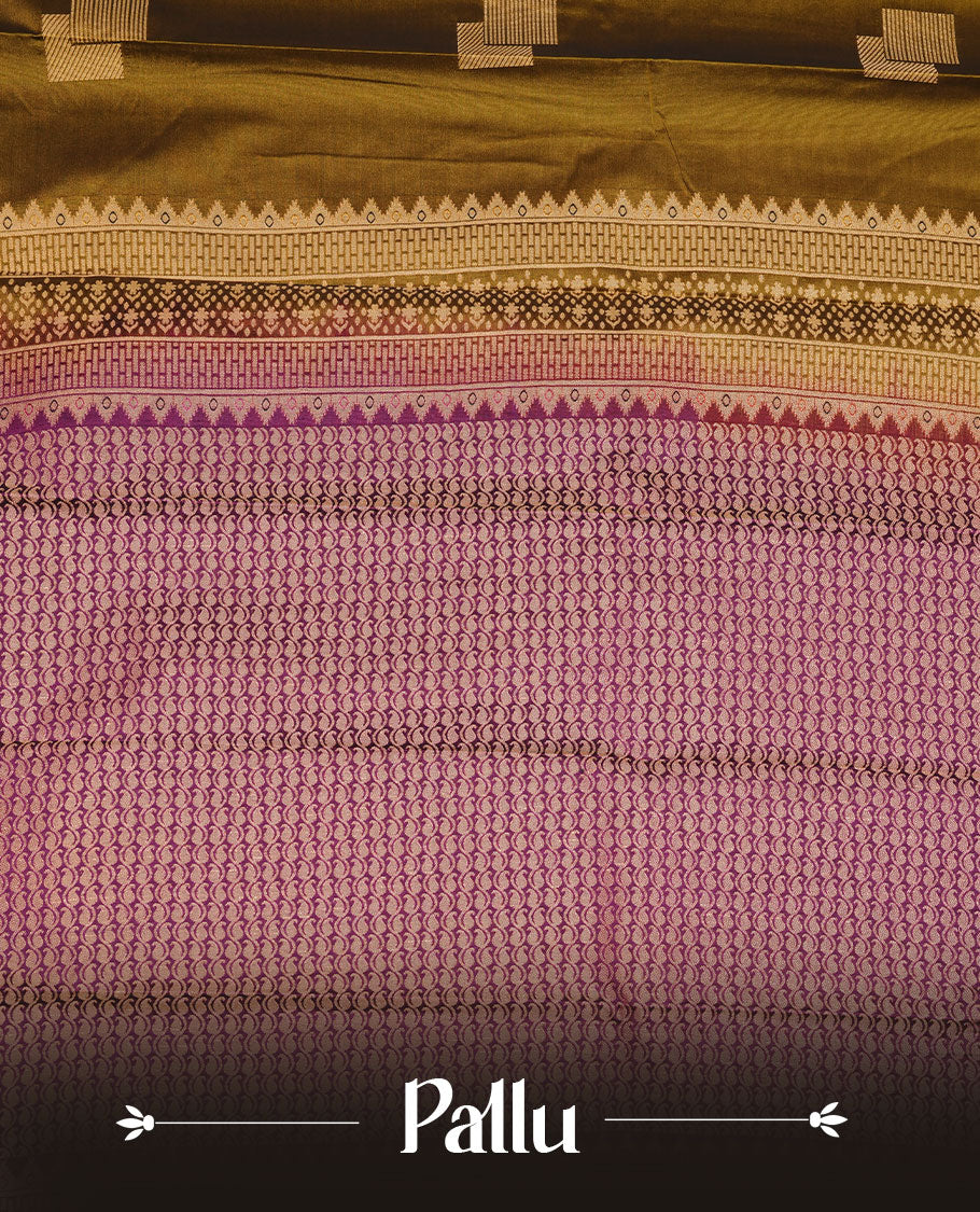 Olive colour soft silk saree featuring Gold zari motifs on body, complemented by contrast purple colour with traditional border, paired with matching blouse piece.