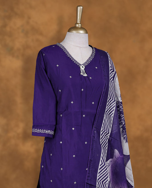 Violet colour churidar set featuring Thread & Beats, mirror embroidered neckline, sleeves, and Floral motifs body , Paired with a matching dupatta