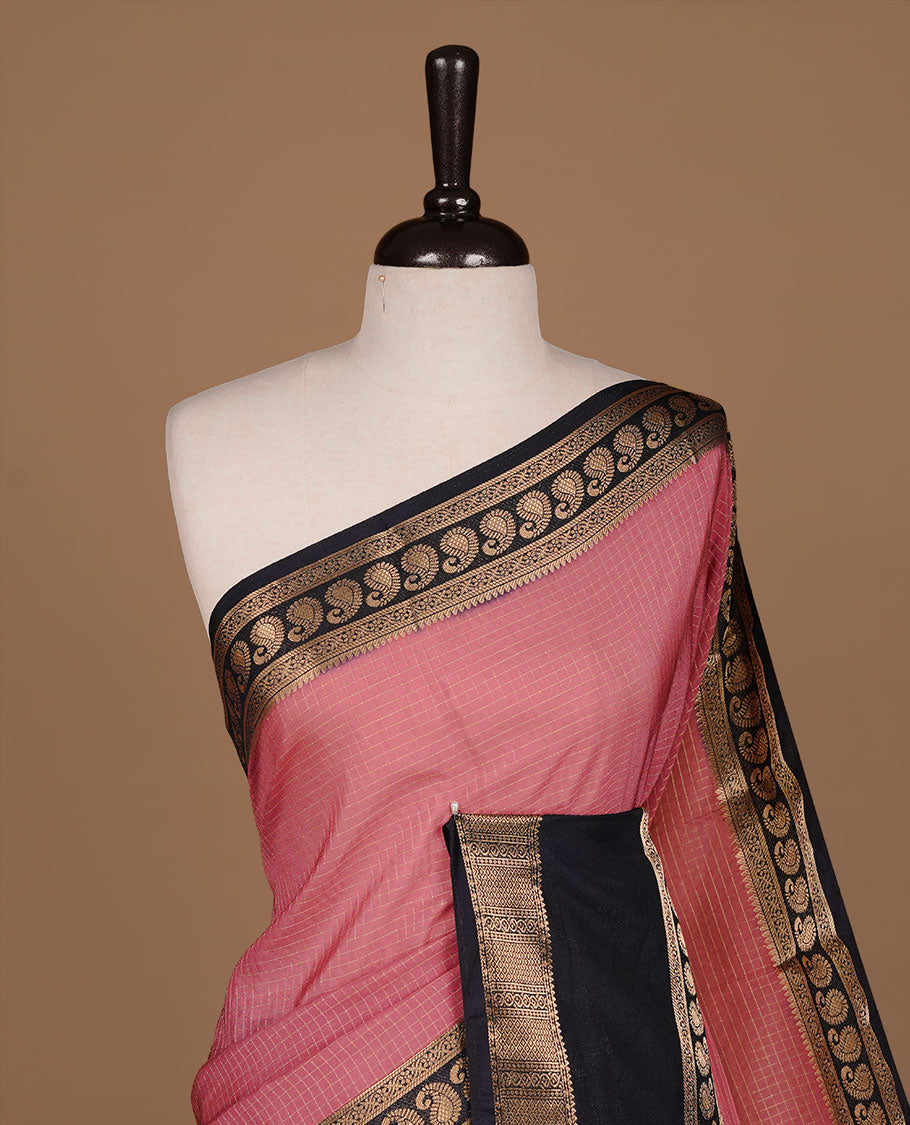 Mauve colour semi georgette saree featuring gold zari check pattern on body, complemented by contrast Black colour with zari border, paired with matching blouse piece.