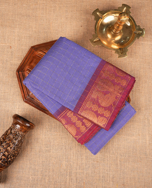 Lavender colour sungudi cotton saree featuring gold zari check pattern across body, contrast Maroon colour with gold zari peacock and floral pattern on border, without blouse piece.