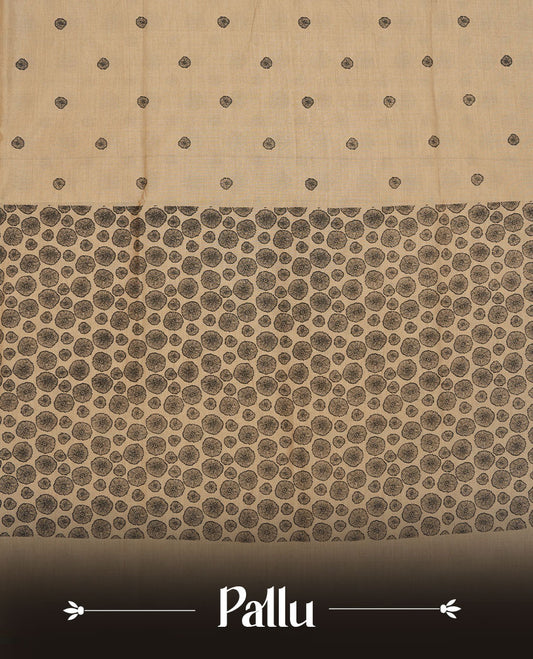Dark Beige colour poly cotton saree with black abstract butti motifs on the body, paired with a matching pallu with dense black textured round butta pattern, and a coordinated all‑over textured round butta printed blouse piece.
