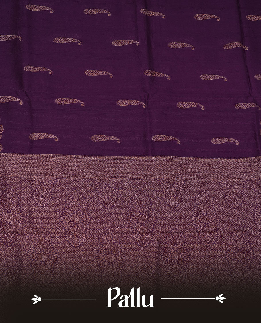 Deep  Purple colour semi banaras tussar georgette featuring gold zari leaf pattern across body, finished with gold zari border and paired with matching blouse.