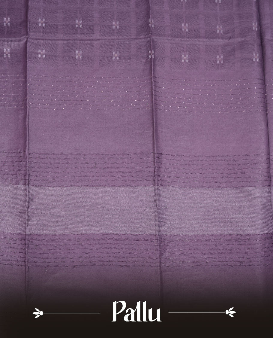 Blue lilac colour semi jute saree highlighting white thread motifs on body, without border and paired with matching blouse.