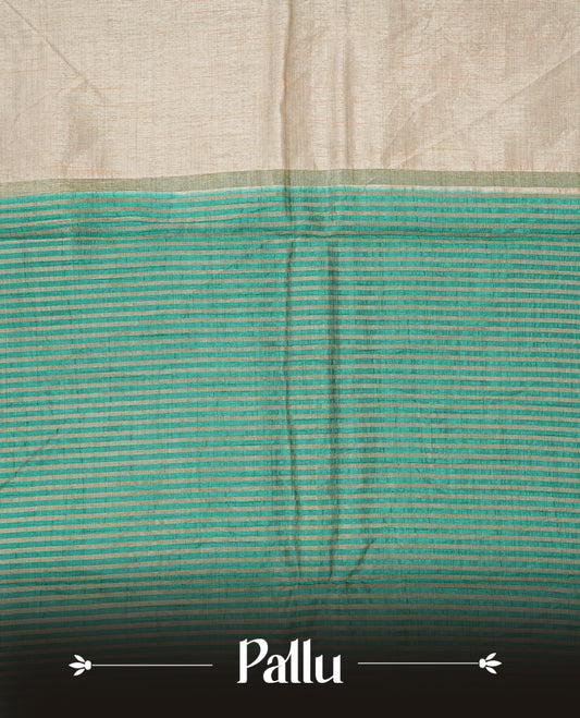 Light Gold Tussar saree featuring Gold zari buttas on body, complemented by contrast Green Colour with Gold zari border, comes with matching blouse piece.