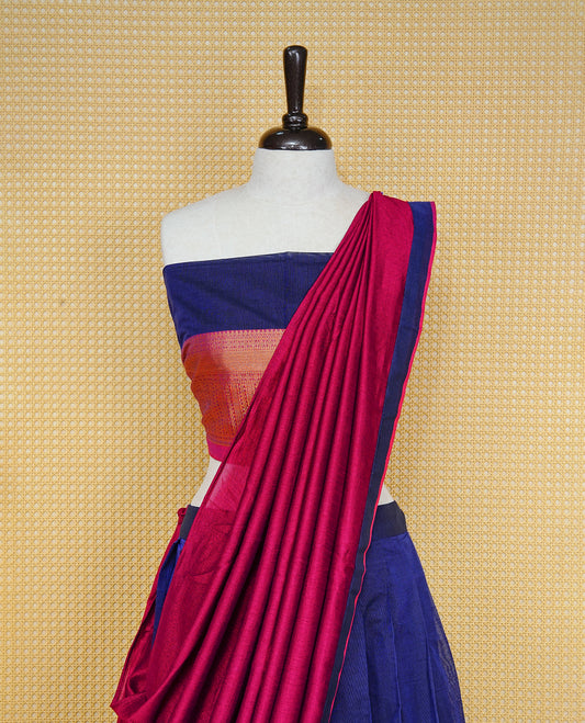 Blue colour Semi Stitched Dhavni set Featuring Blue Skirt With Contrast Maroon colour with Zari border, paired with UnStitched Blouse & Elegant Dupatta.