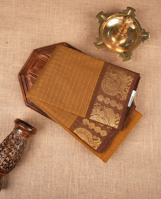 Goldenrod colour sungudi cotton saree featuring gold zari check pattern across body, contrast Brown colour with gold zari peacock pattern on border, without blouse piece.