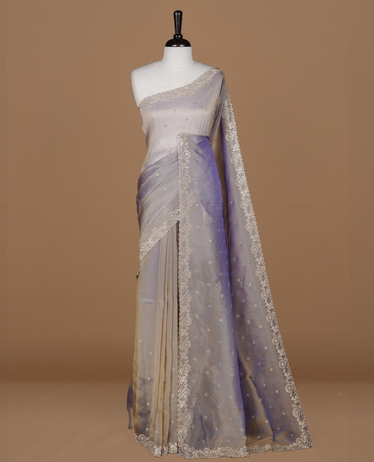 Lavender colour designer saree featuring stone worked body, stone worked border, paired with matching blouse piece.