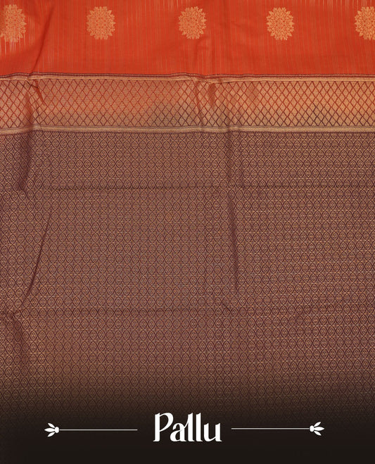 Dark Rust orange colour semi silk saree featuring gold zari stripes and floral motifs on body highlighting contrast dark chocolate gold zari peacock border , paired with matching blouse