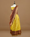 Olive colour semi stitched Half saree featuring contrast chocolate brown colour with gold zari traditional border skirt, paired with matching zari border dupatta, unstitched blouse piece