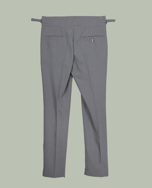 Grey colour men’s pant featuring a clean waistband with side buckle adjusters, neat front pleats, slant pockets and back welt pockets, finished with a straight leg fit.
