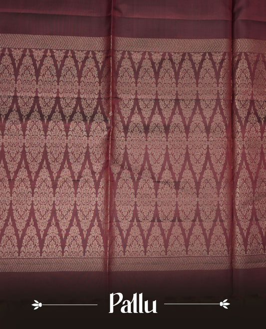Chocolate Brown colour mayuri silk saree featuring gold zari motifs on body, complemented by self colour with traditional border with tassel at pallu, paired with matching blouse piece.