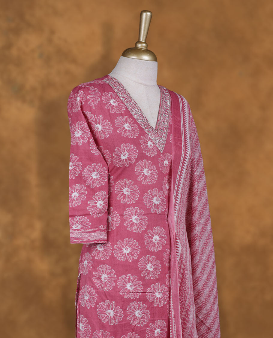 Dusty pink colour churidar set featuring thread & cut beats embroidered on neckline, sleeves, and white colour floral printed pattern on body , Paired with a matching dupatta