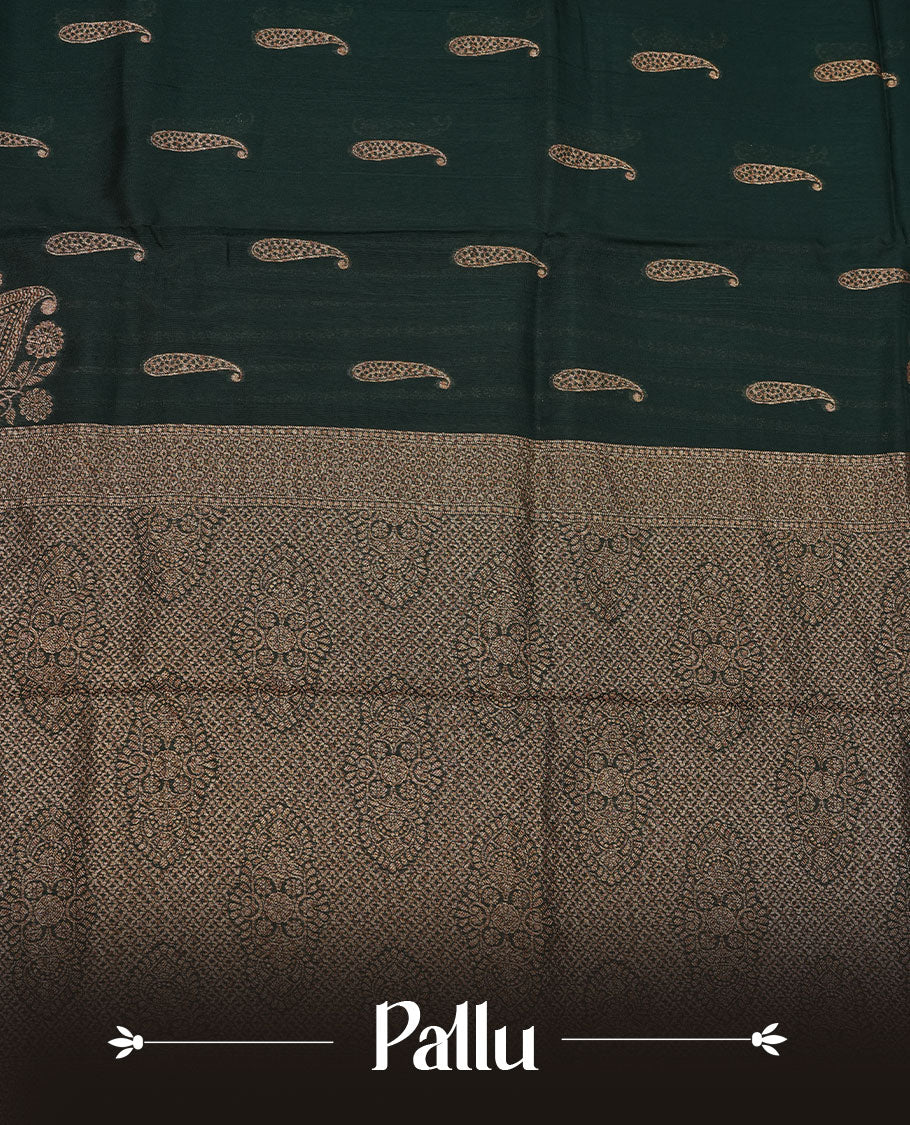 Dark green colour semi banaras tussar georgette featuring gold zari leaf pattern across body, finished with gold zari border and paired with matching blouse.