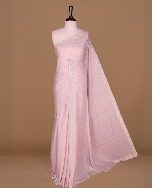 Pink colour organza designer saree featuring Gold stone motifs on body, highlighting light weight stone worked border, paired with matching blouse piece.