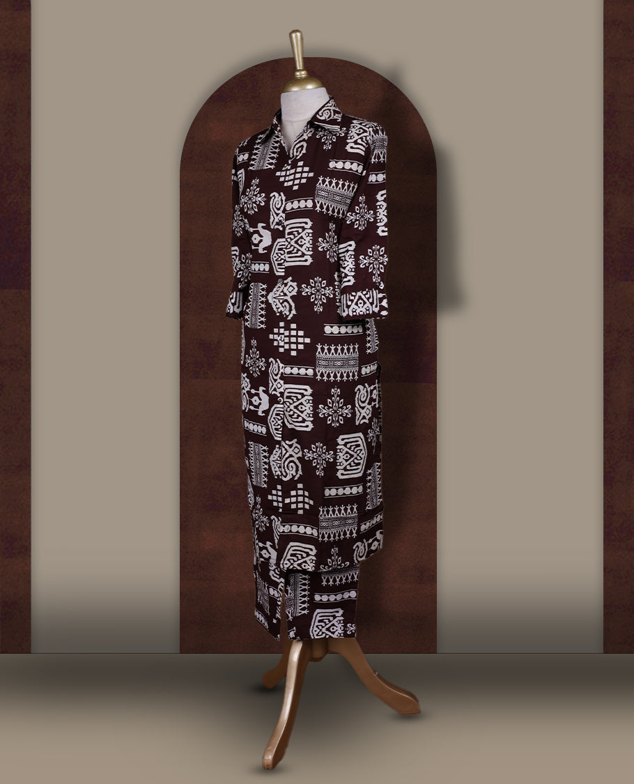 Deep brown colour cotton coord set featuring charming bold off white prints all over, Designed with a classic shirt collar and 3/4 sleeves, paired with matching straight pants for a trendy, relaxed, and comfy everyday look.