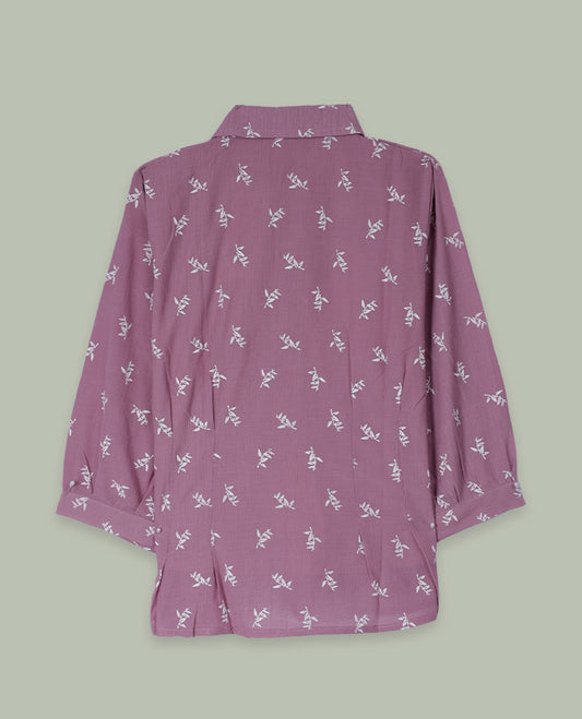 Dusty mauve printed shirt top with collared neckline, three-quarter sleeves, and front lace-trimmed button placket.