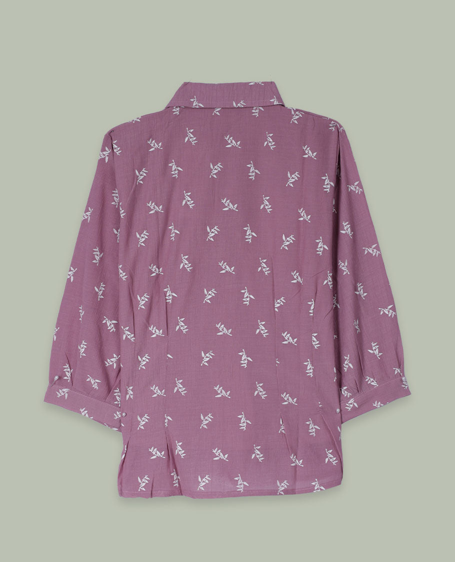 Dusty mauve printed shirt top with collared neckline, three-quarter sleeves, and front lace-trimmed button placket.