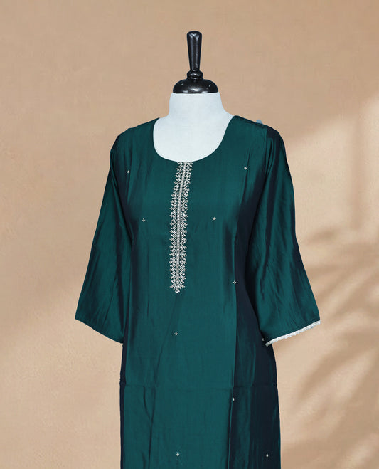 Peacock Green Kurti featuring a plain solid body with delicate scattered silver butti embroidery, a wide round neckline Adorned With Stone  & Bead work , 3/4 Sleeve Design.