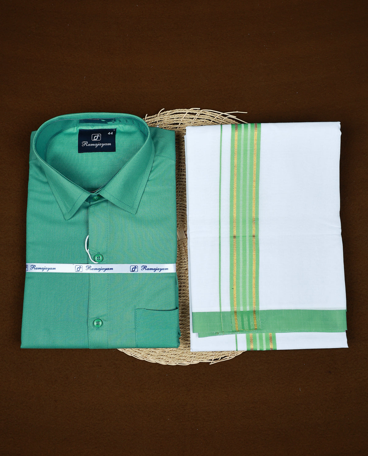 Green colour RAMAJAYAM shirt paired with a matching dhoti, finishing with a Green & gold kara