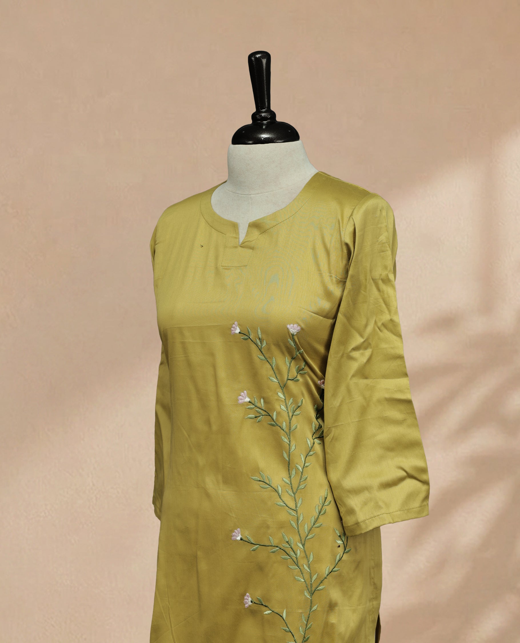 Pastel Green Colour Kurti Featuring U-Shaped Neckline, delicate  floral vine embroidery Work On Body & Sleeve