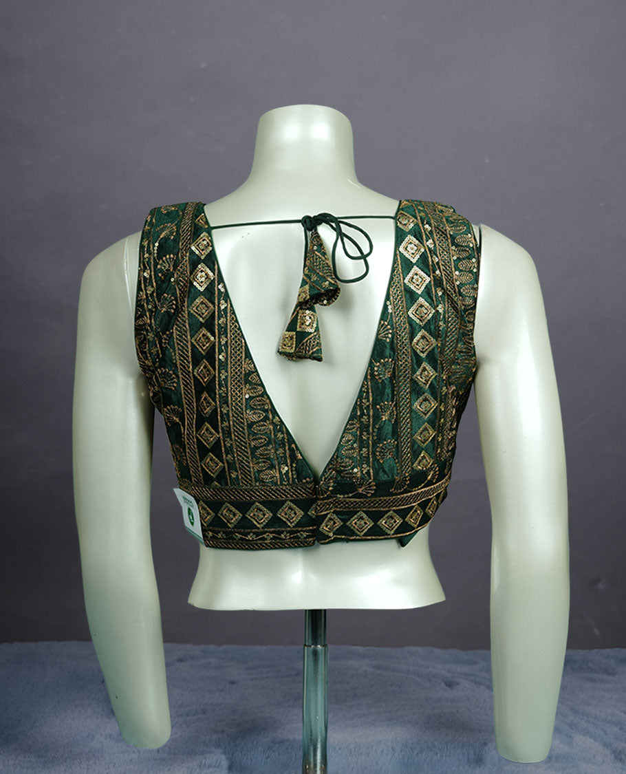 Dark Green colour embroidered sleeveless blouse with intricate geometric motifs, deep V neckline, and tie-up back detailing for a chic finish.