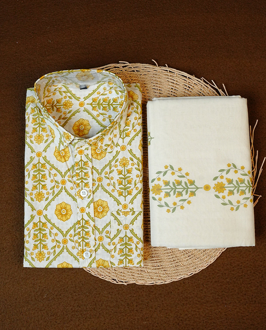 Cream Colour Floral Kodi Printed Half-Sleeve Shirt, Paired with a Cotton Double Dhoti Featuring Matching Prints.