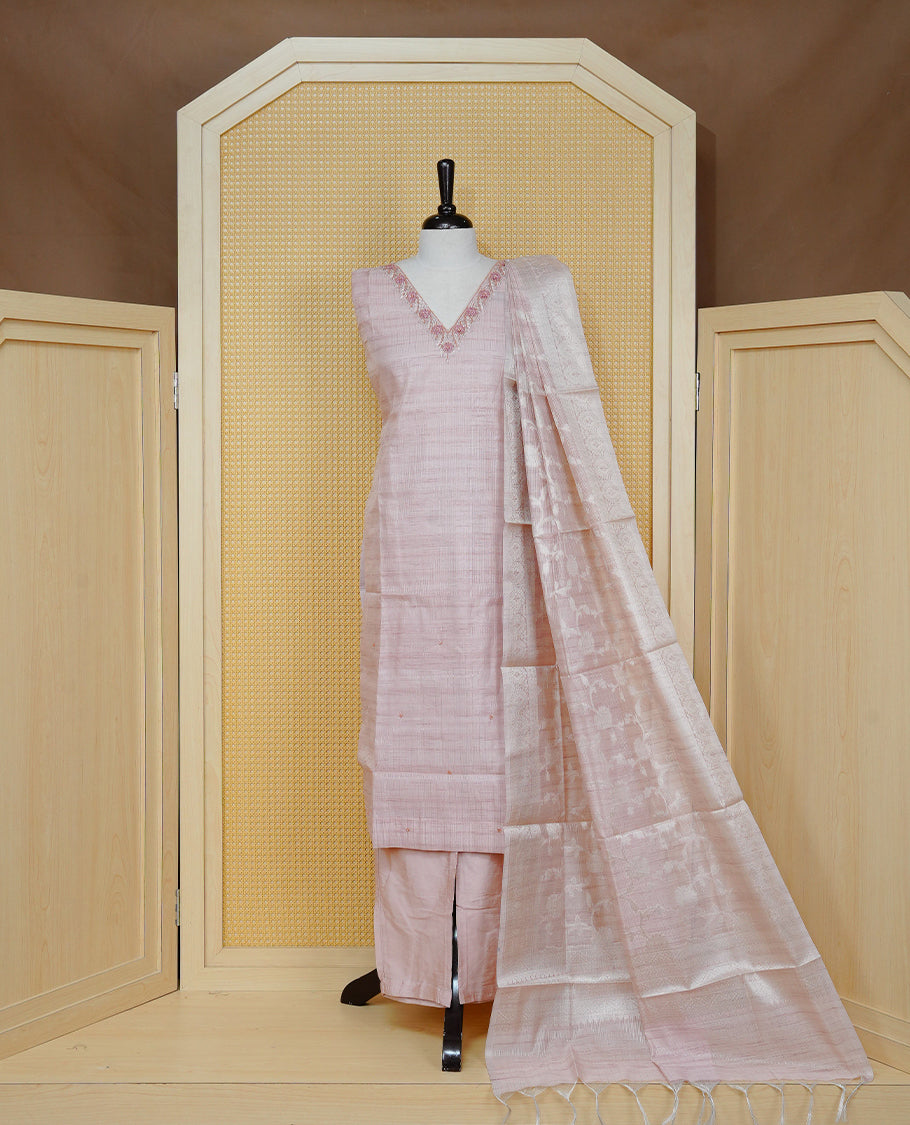 Blush pink colour churidar set with floral bead and thread embroidery on the V-neckline, paired with a matching woven dupatta and solid pants.