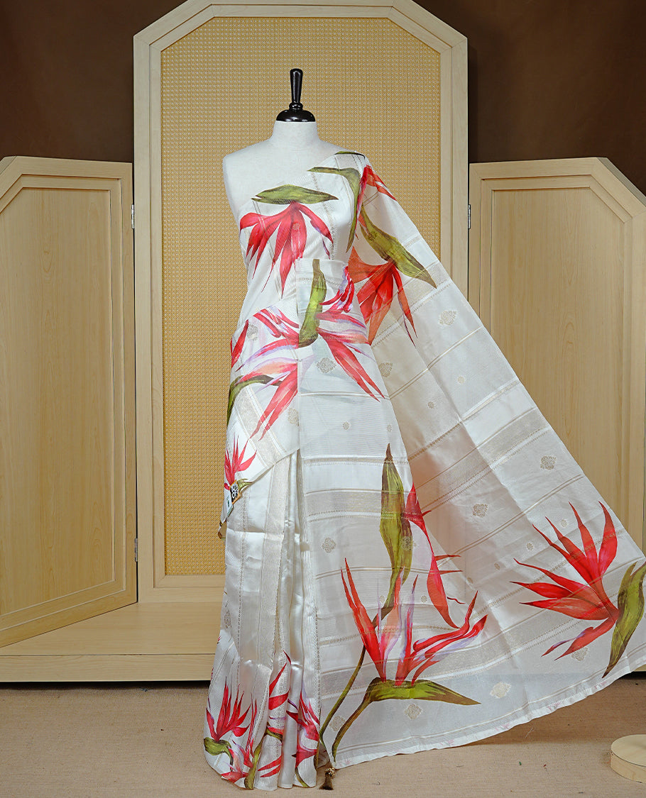Cream Colour Organza Kerala Saree Featuring Floral Printed Motifs On The  Body & Tassels On The Pallu, Paired With A Matching Blouse Piece.