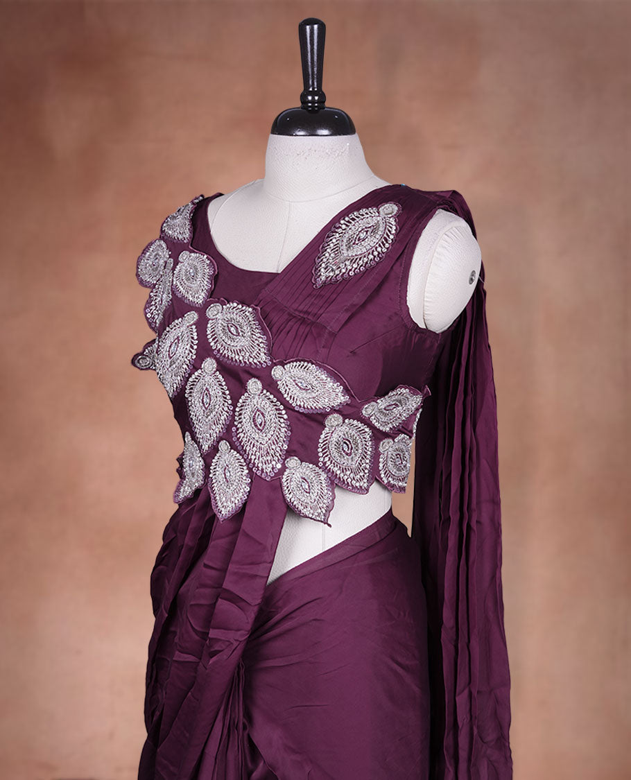 Deep maroon colour ready to wear saree featuring bold silver applique embroidery on the drape, paired with a sculpted matching blouse