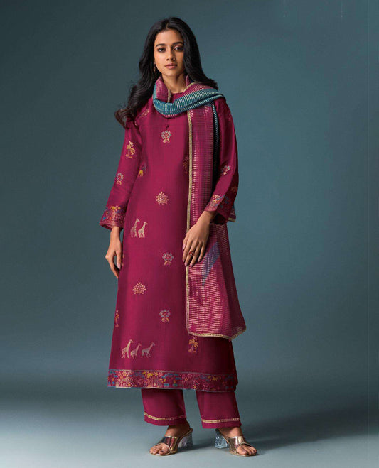 Deep maroon colour suit material with Olivia silk jacquard top featuring elegant digital prints, paired with classic silk bottoms, and completed with a silk jari lining dupatta highlighted by digital prints