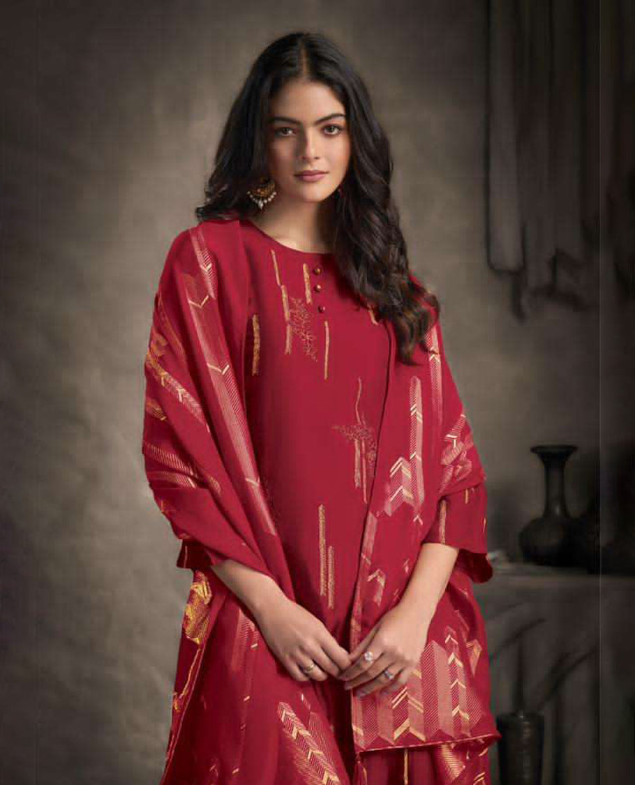 Red colour suit material with Rubina silk top adorned with elegant embroidery work, paired with luxurious satin bottoms, and completed with a muslin jacquard dupatta featuring rich woven detailing
