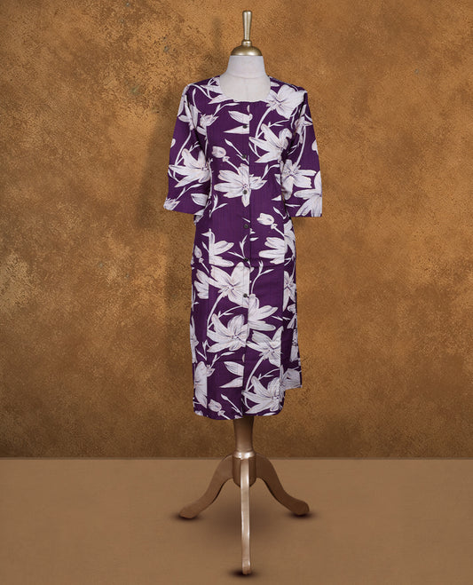 Purple colour kurti adorned with White floral prints, featuring a round neckline with button placket and comfy 3/4th sleeves.