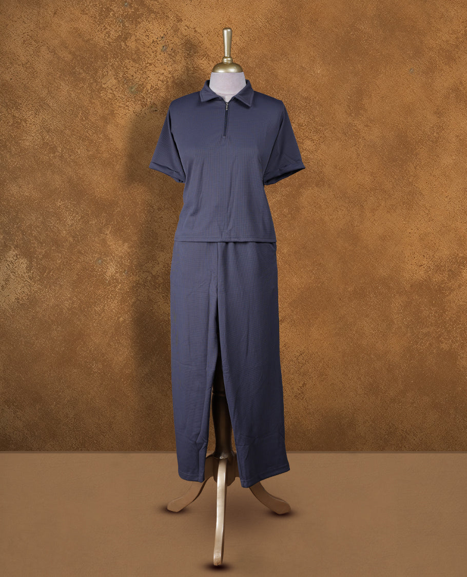 Gray colour coord set styled with a T shirt design with zip detailed & collar , short sleeve, pair a matching bottom pant .