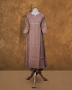 Nude brown colour coord set featuring beats and thread across neckline and matching bottom pant.