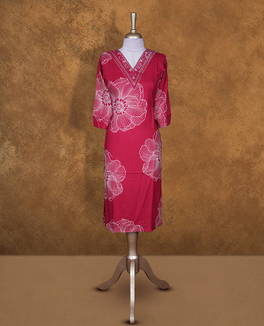 Rani pink colour kurti with White floral prints, knee length design, styled with a thread work on  V neckline  and a sleeve .