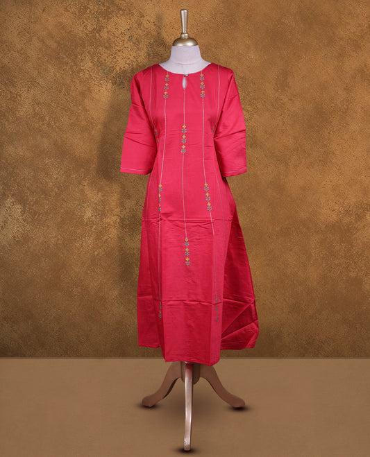 Red colour kurti with styled with a thread pattern around neckline & across body, knee length design, and a sleeve .