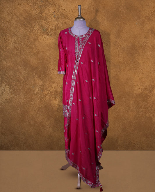 Rani pink colour sharara set featuring gold thread and beats embroidered neckline, sleeves, and thread embroidery on body , Paired with a matching dupatta