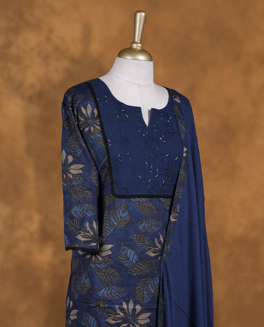 Dark blue colour churidar set featuring elegant Light gold cut beat embroidery on the neckline, sleeves, and floral pattern across the body, Paired with a matching dupatta
