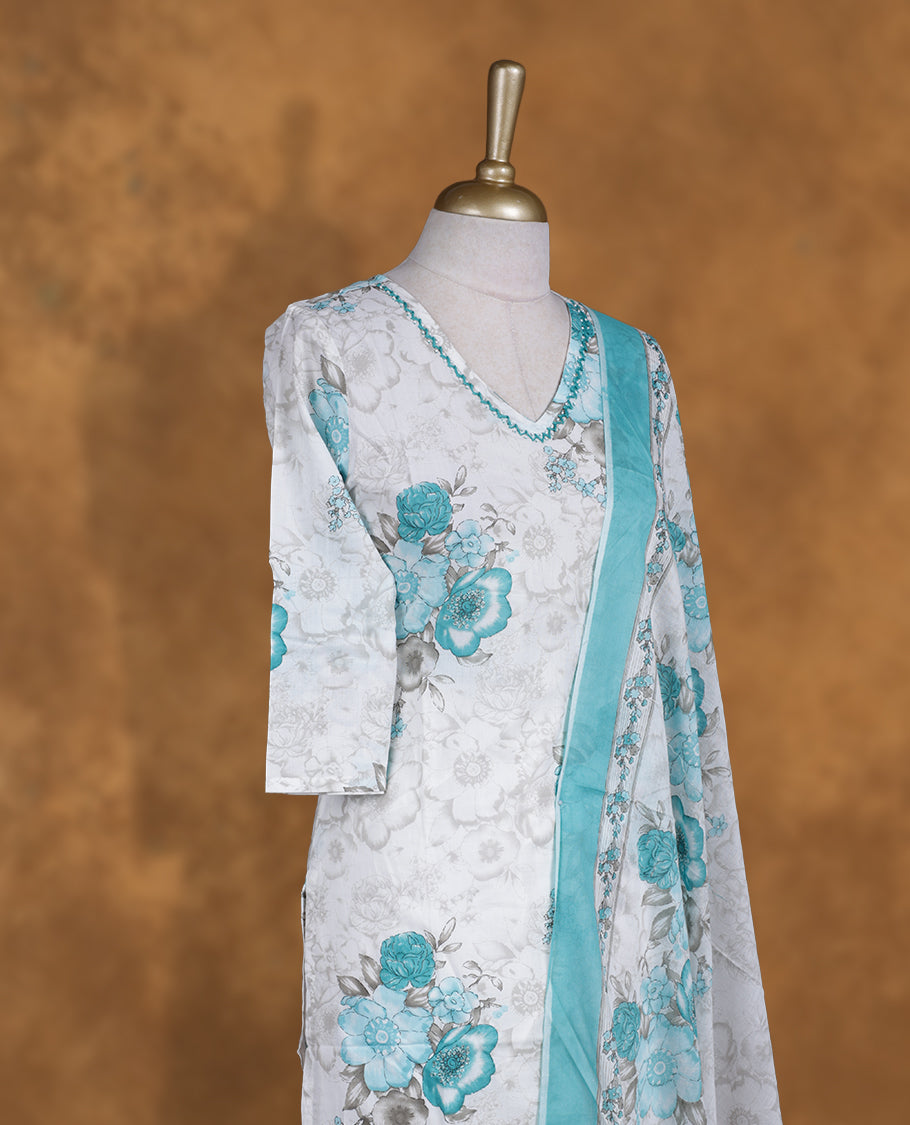 Aqua green & white colour churidar set featuring thread embroidered neckline, sleeves, and Floral printed pattern on body , Paired with a matching dupatta