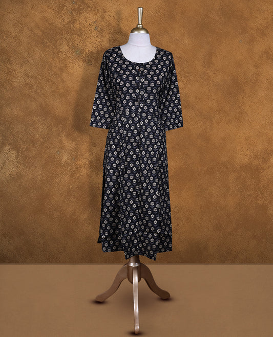 Black colour kurti with styled with a floral print across body, knee length design, and a sleeve .
