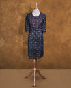 Dark blue  colour kurti with styled with a thread pattern around neckline, print on body knee length design, and a sleeve .
