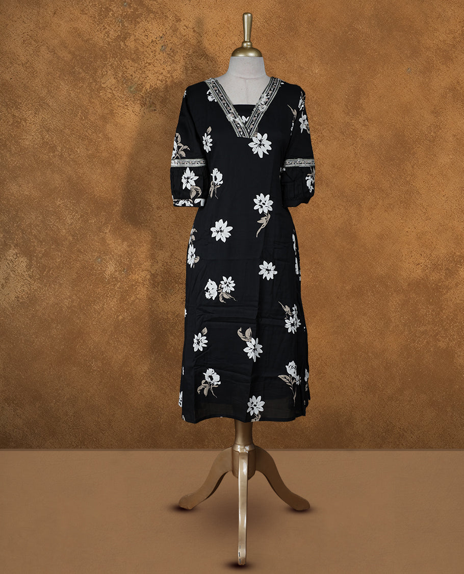 Black colour floral printed kurti featuring a V-neckline accented with thread-pattern detailing, a knee-length silhouette, and three-quarter sleeves