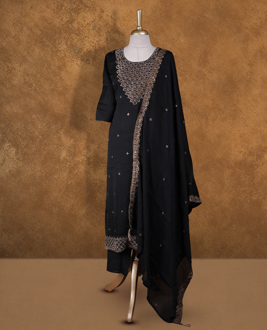 Black colour sharara set featuring thread embroidered and stone neckline, sleeves, and thread embroidery on body , Paired with a matching dupatta