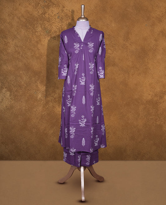 Purple colour coord set featuring cream colour floral pattern across body with v neckline and matching pant.